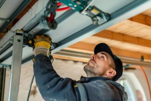 why overhead door squeaks